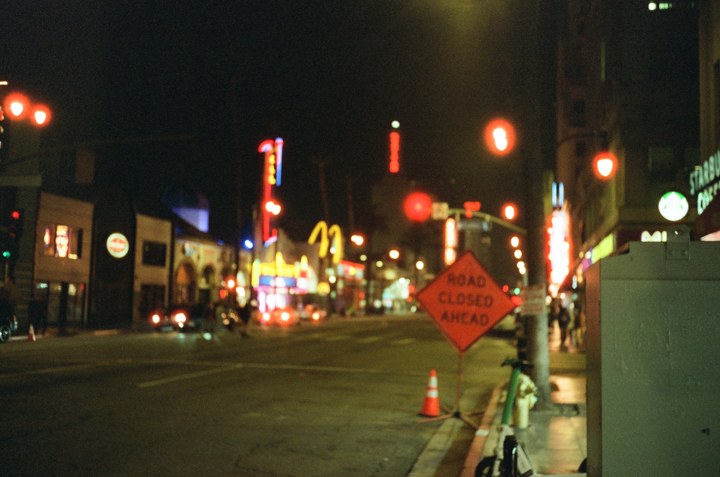 Soft neon lights along a California street at night